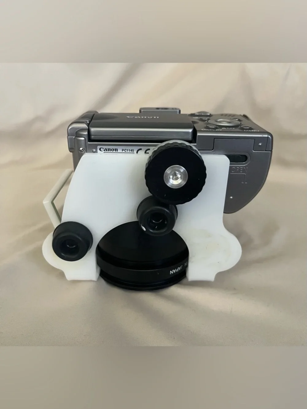 Canon PowerShot A620 digital camera with Photomed dental photography attachment
